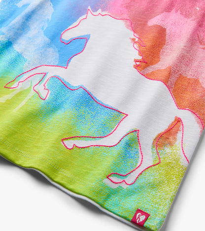 Girls white graphic tee with colorful running horse print and pink outline, close-up of hem and logo tag