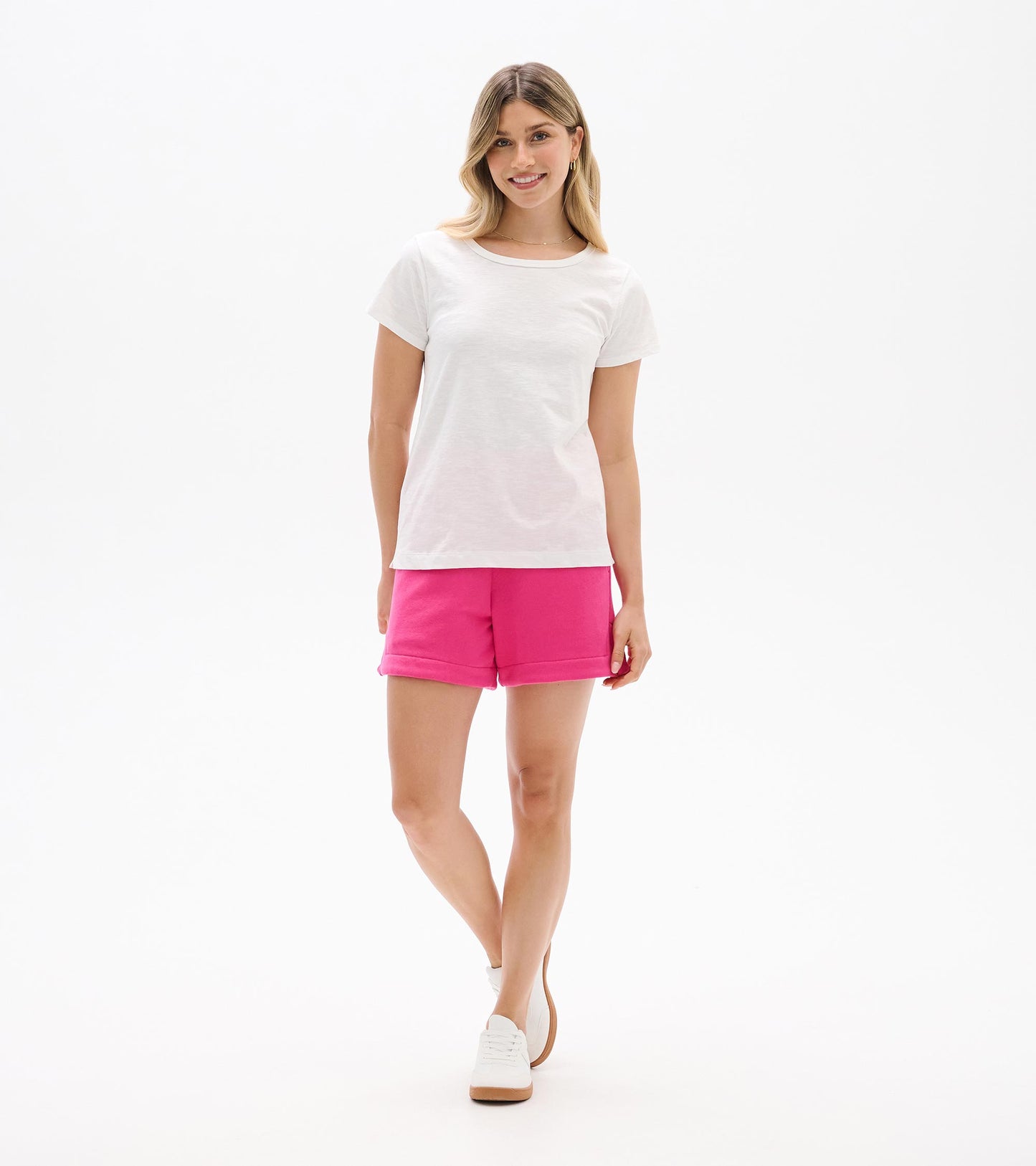 White short-sleeve crew neck tee on a woman, front view, with a relaxed fit.