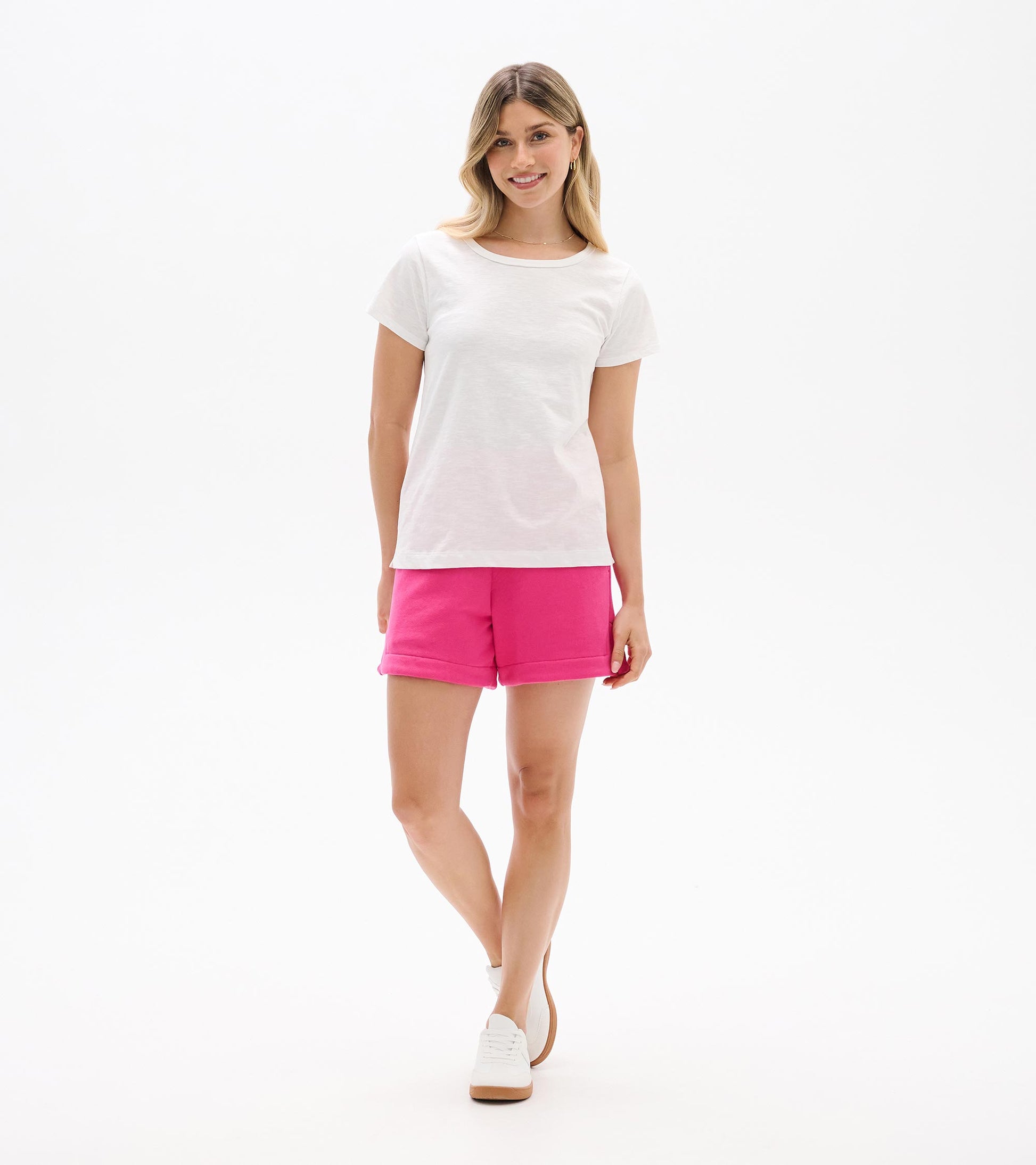 White short-sleeve crew neck tee on a woman, front view, with a relaxed fit.