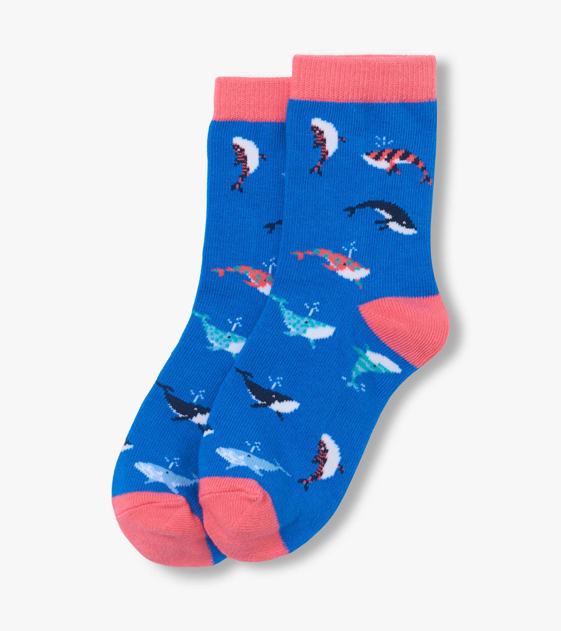 Blue crew socks with pink cuffs and toes, featuring colorful whale pattern, shown folded pair