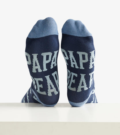 Navy crew socks featuring light blue "PAPA BEAR" text, designed for casual wear.