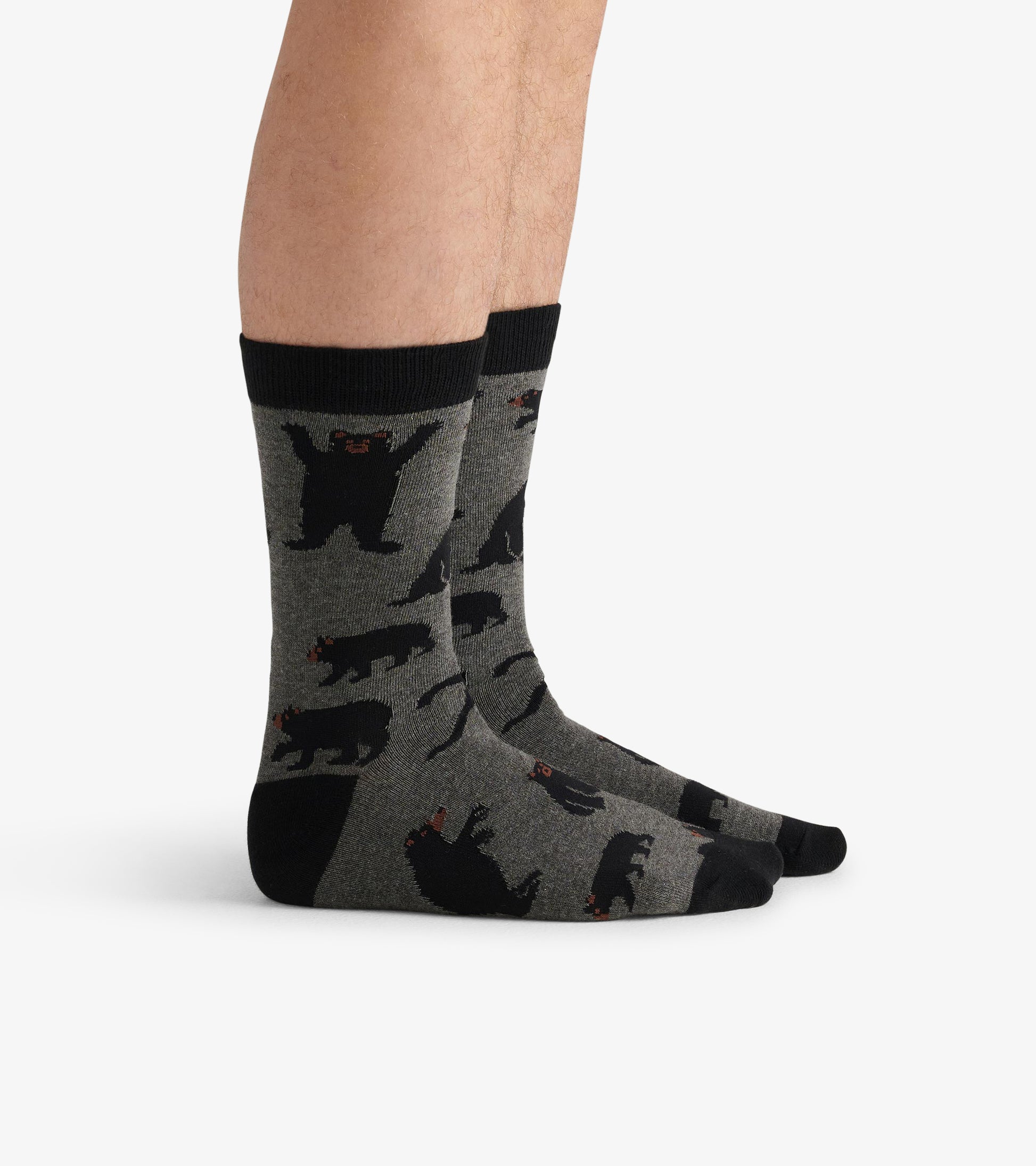 Gray crew socks featuring black bear patterns, with a black cuff and toe. Suitable for casual wear.