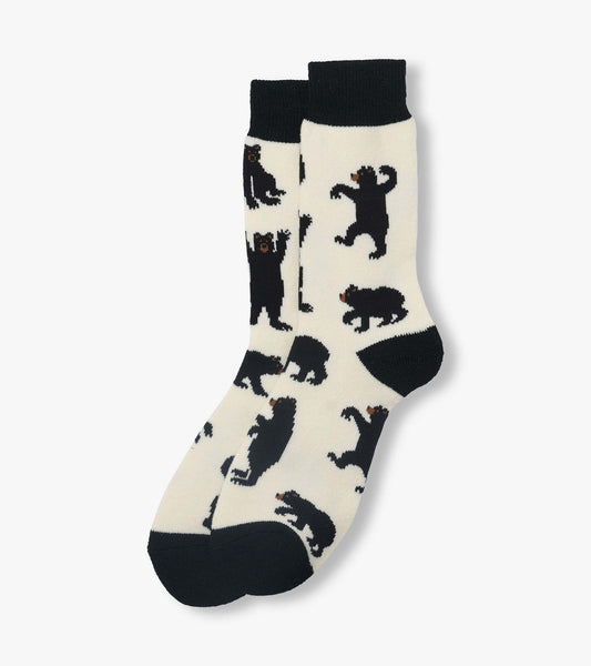 Black and cream crew socks with allover bear pattern and black toe, heel, and cuff