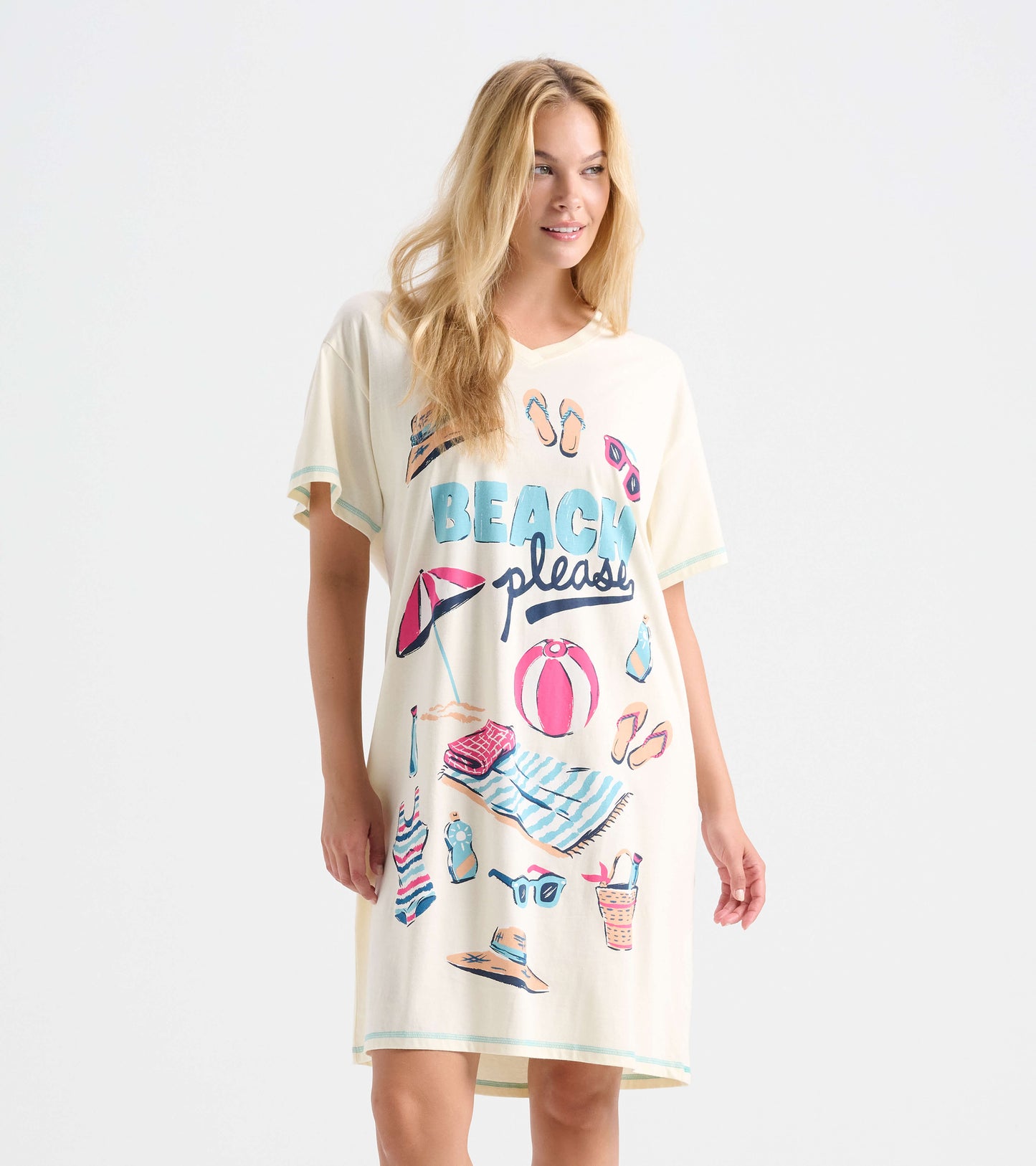 Women's cream V-neck sleepshirt with beach-themed print, shown on model from front