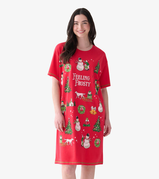 Model wearing a red knee-length sleepshirt with short sleeves and holiday print, featuring Feeling Frosty text