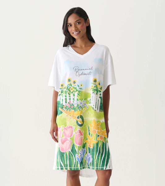 White V-neck sleepshirt with colorful floral garden print and “Perennial Optimist” text, front view