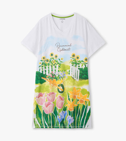 White V-neck sleepshirt with colorful garden print, sunflowers, tulips, and floral text on the front.