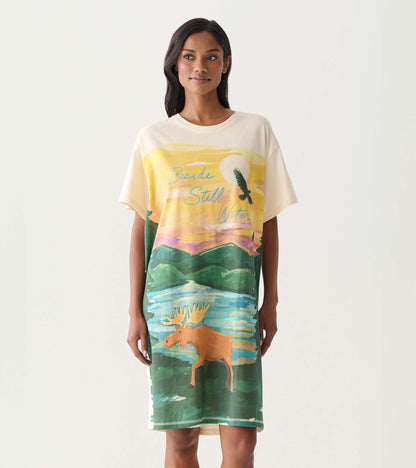 Cream short-sleeve sleepshirt with colorful sunset, lake, moose, and bird graphic print, front view
