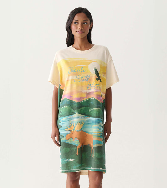 Cream short-sleeve sleepshirt with colorful sunset, lake, moose, and bird graphic print, front view