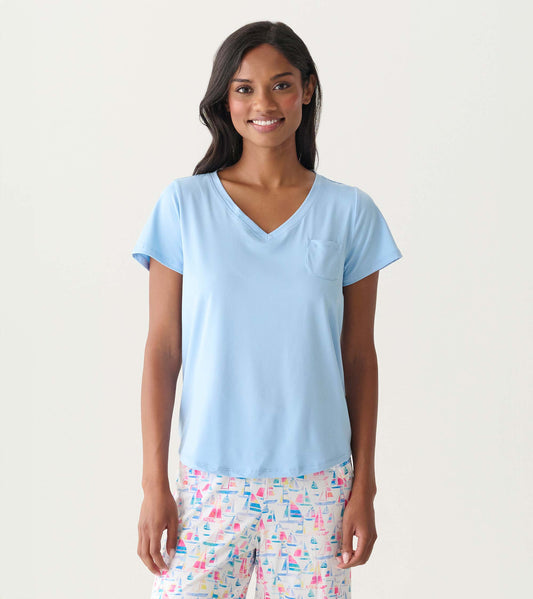 Women's placid blue V-neck T-shirt with short sleeves and a small chest pocket, shown on model