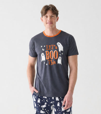 Model wearing charcoal Let’s Boo This T-shirt with orange neckline and ghost graphic