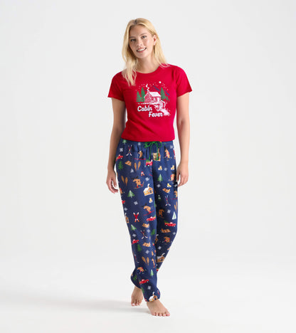 Red short-sleeve pajama t-shirt with "Cabin Fever" graphic, paired with navy pajama pants featuring a winter-themed print.