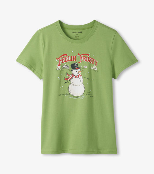 Front of sage green pajama T-shirt with Feelin' Frosty text and snowman graphic in a black hat and striped scarf