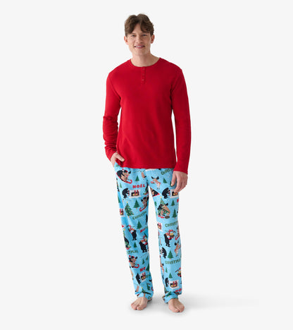 Men's red waffle henley, front view, paired with light blue pants printed with holiday scenes