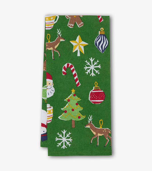 Folded green Christmas tea towel with Santa, reindeer, tree, ornaments, candy canes and snowflakes