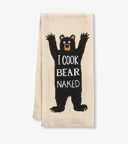 Cream tea towel featuring a playful black bear graphic and the text "I COOK BEAR NAKED." Ideal for kitchen use.
