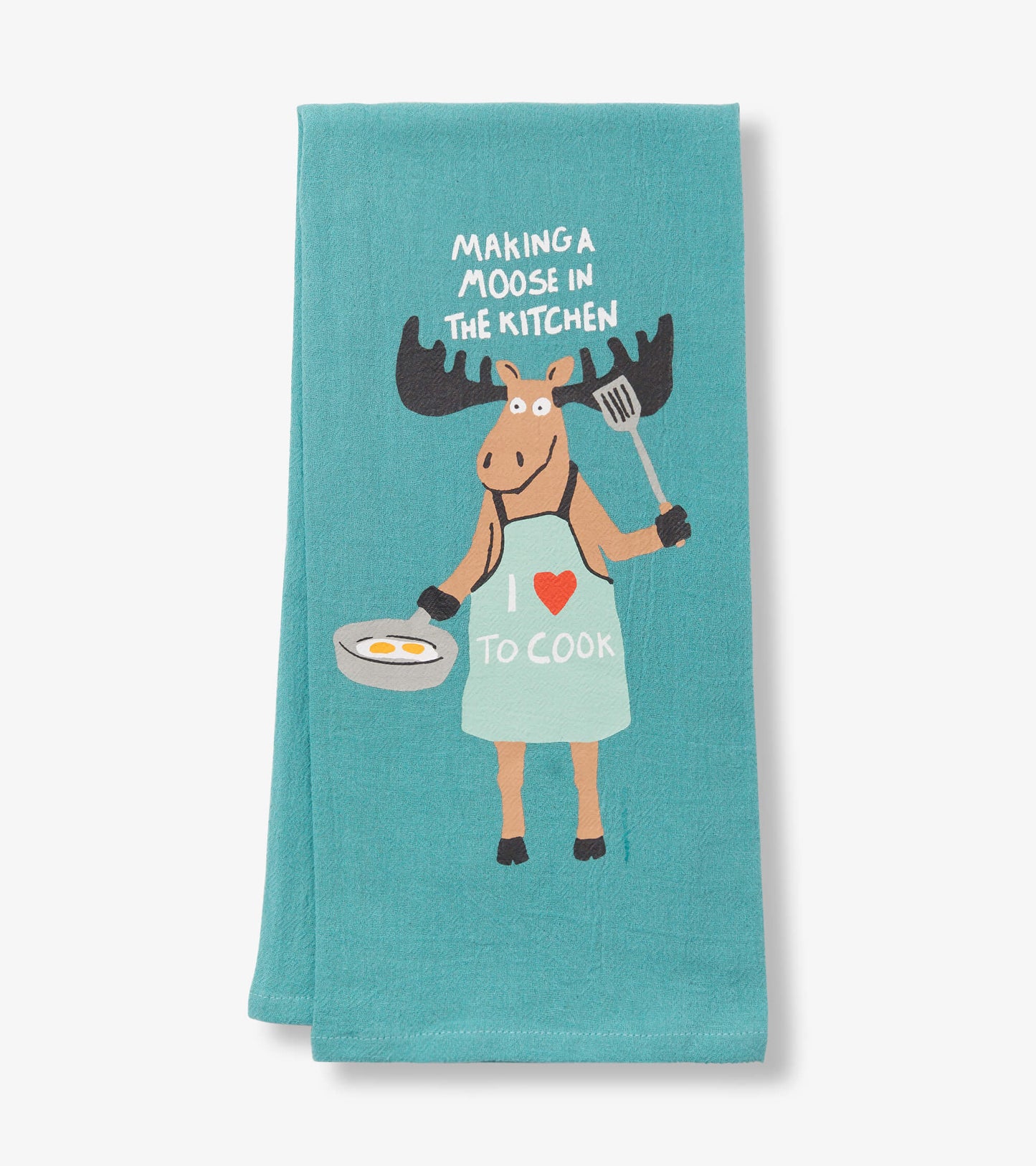 Turquoise tea towel featuring a cartoon moose in an apron holding a frying pan and spatula with the text "Making a Moose in…