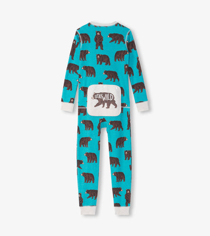 Turquoise onesie featuring brown bear prints and a "Stay Wild" patch on the back. Long sleeves and fitted legs.
