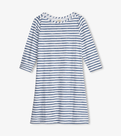 White dress with blue watercolor stripes, 3/4 sleeves, and a relaxed fit, ideal for summer wear.