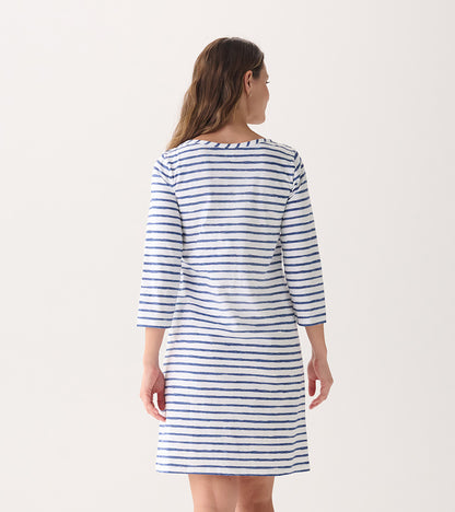 Back view of a women's summer dress featuring watercolor stripes in blue and white, with 3/4 sleeves and a relaxed fit.