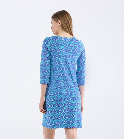 Blue dress with a painted diamond pattern and three-quarter sleeves, viewed from the back.