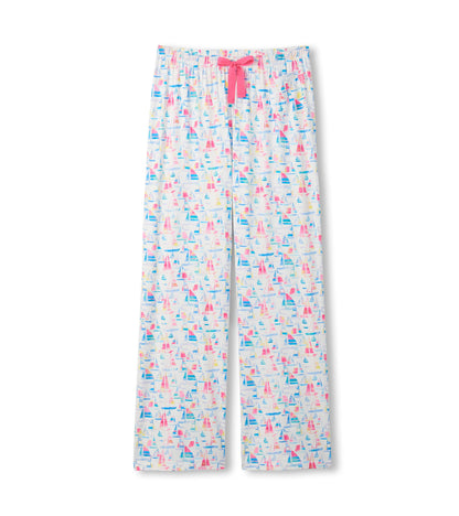 White pajama pants with colorful sailboat print and pink drawstring waistband, front view