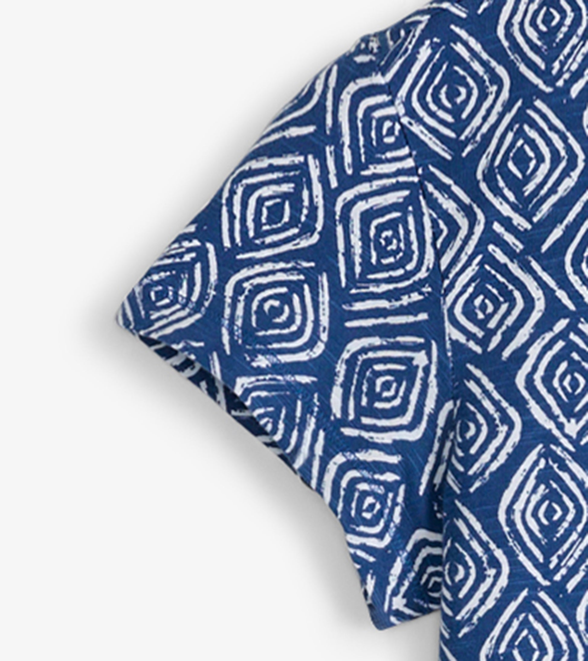 Blue crew neck t-shirt dress featuring a white geometric pattern, short sleeves, and a relaxed fit.