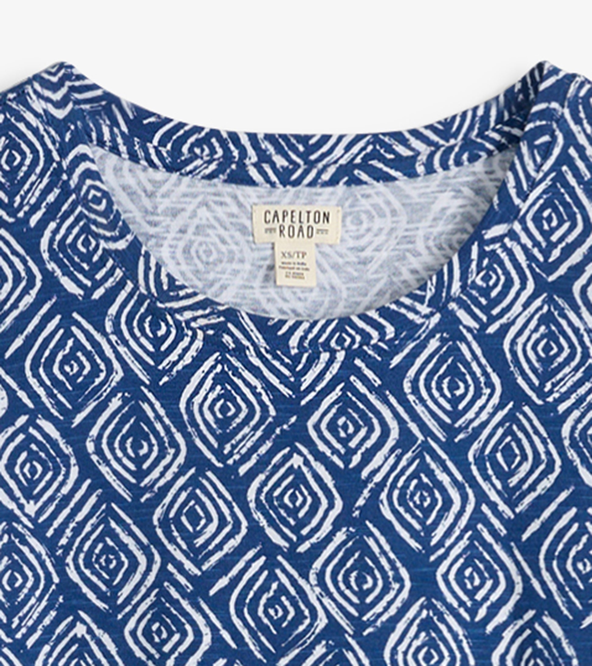 Blue crew neck t-shirt dress featuring a white diamond pattern, made from soft fabric, ideal for casual wear.
