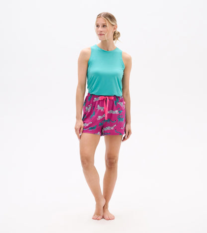 Women's pajama shorts in pink with a cheetah print, featuring an elastic waistband and drawstring. Ideal for lounging.