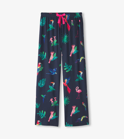 Navy polyknit pajama pants featuring a colorful tropical bird and leaf pattern, with an elastic waistband and pink drawstrin…