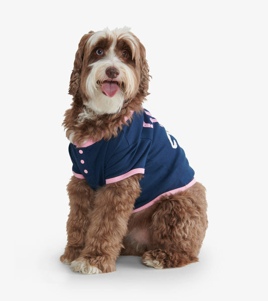 Navy blue dog tee with pink trim and buttons, featuring a playful design, suitable for casual wear.