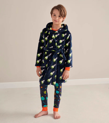 Navy fleece robe with rocket pattern, featuring an orange trim, worn by a child over space-themed leggings.