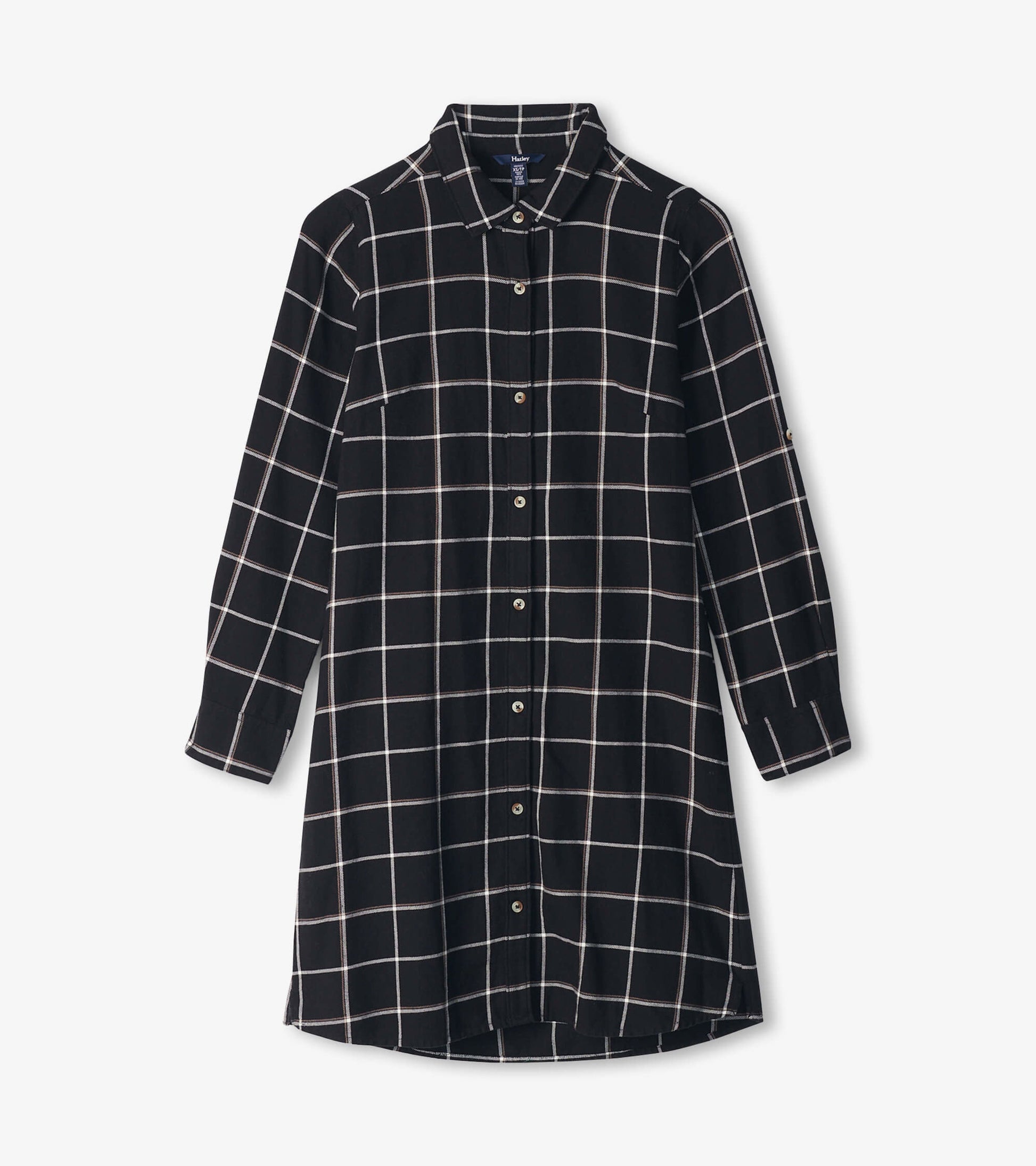 Black shirt dress featuring a windowpane pattern, long sleeves, and a button-down front.