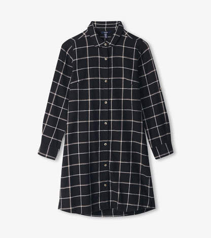 Black shirt dress featuring a windowpane pattern, long sleeves, and a button-down front.