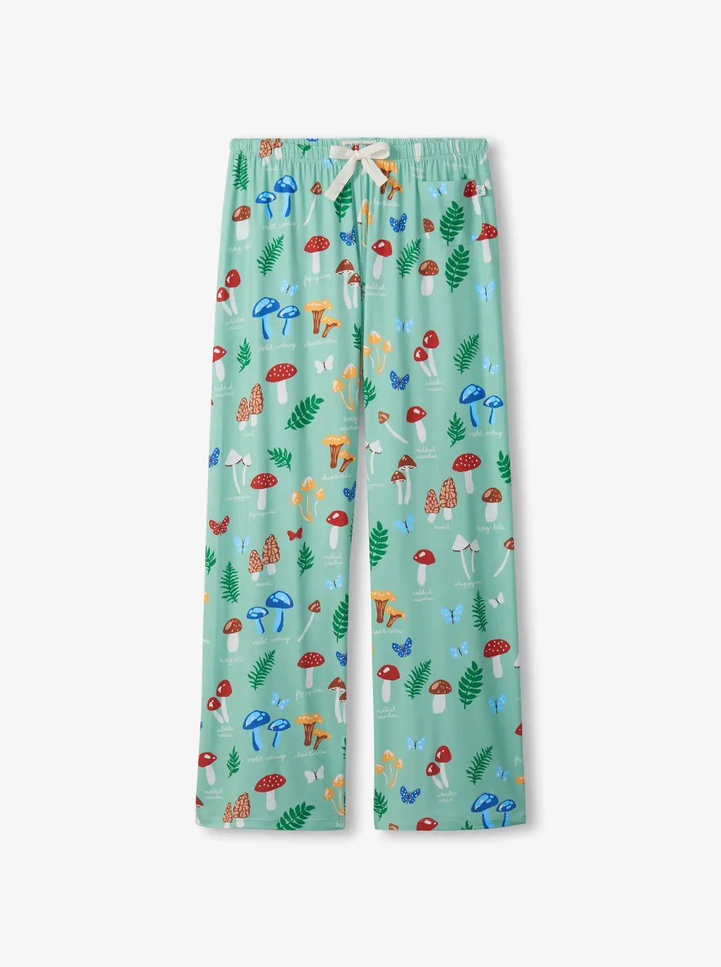 Shop women's pajama bottoms. Showing mint green pajama pants with a colorful mushroom and foliage print.