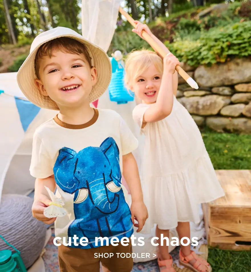 Promotes toddler apparel. Showing two toddlers playing outdoors, one wearing a blue elephant graphic tee.